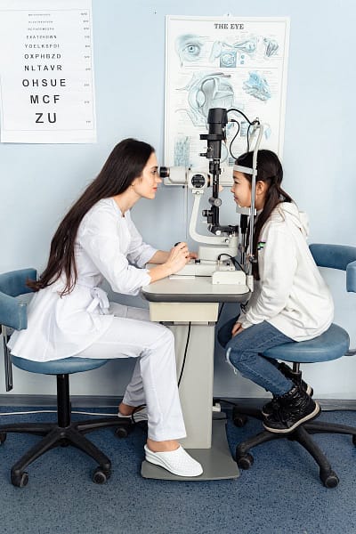 Eyesight Check - A Doctor Checking Up Her Patient